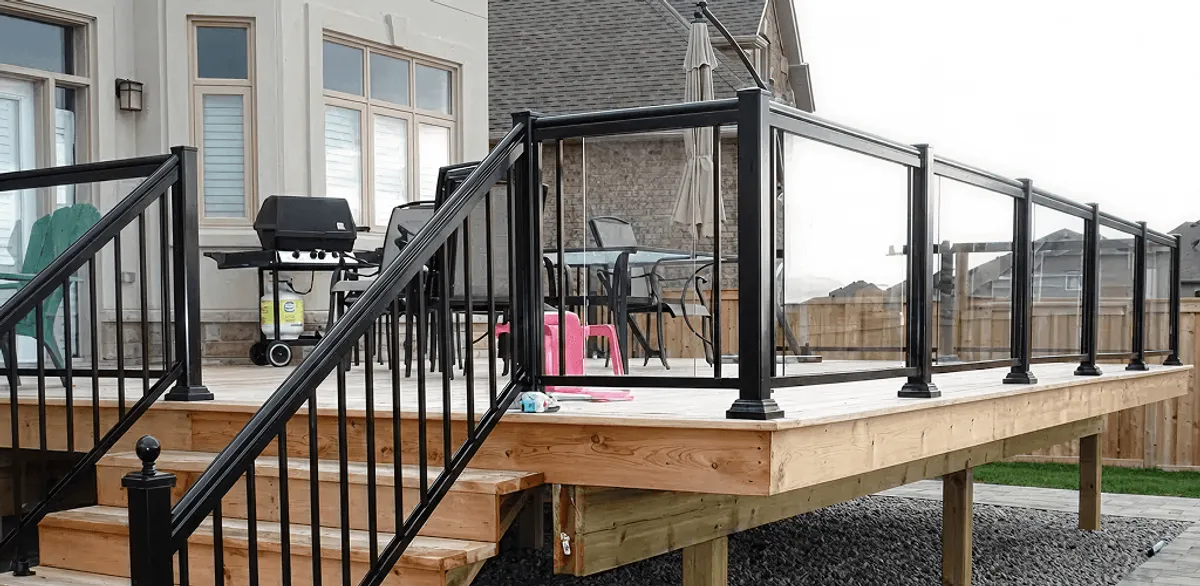 Handrail installation on a deck staircase for safety and code compliance in Yonkers, NY